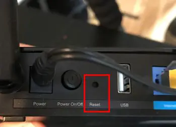 Reset button on back of router
