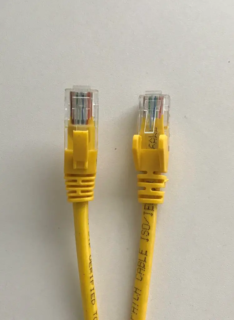 Two different category ethernet cables of the same color