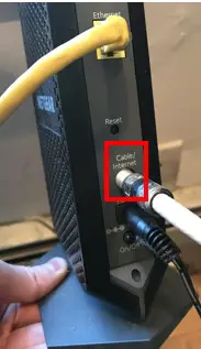 Coaxial cable in back of modem