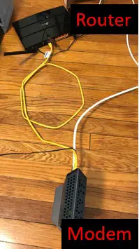Example of a modem and router connected with an ethernet cable